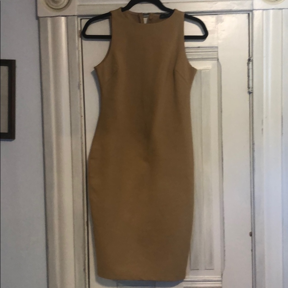 Tan sheath dress.